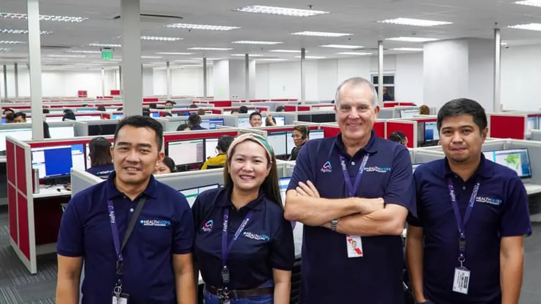 Rob Brough with three Healthscope colleagues in the office